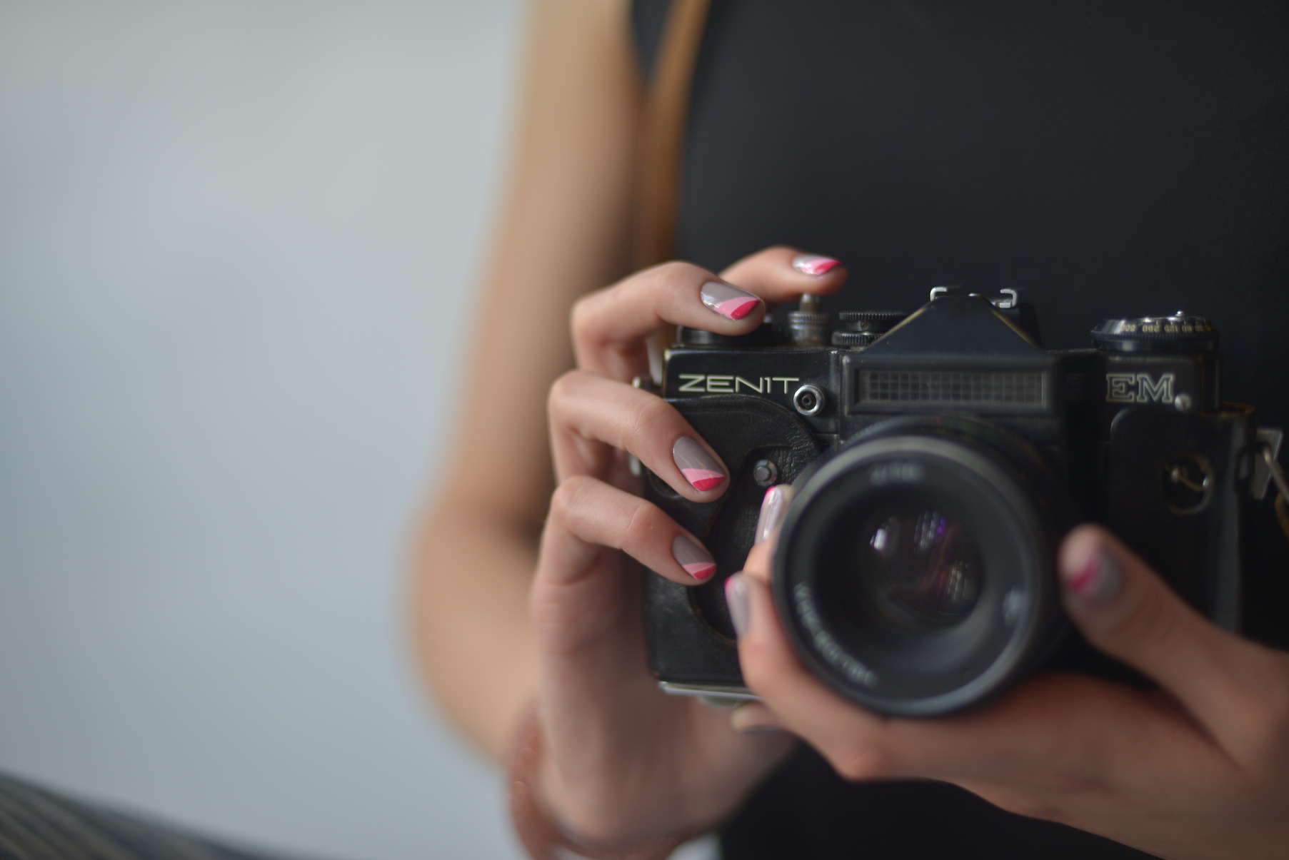 Person Holding Black Nikon Dslr Camera